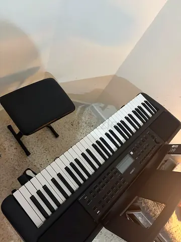 Yamaha electronic keyboard with bench, pedal, stand and dust cover. Perfect condition