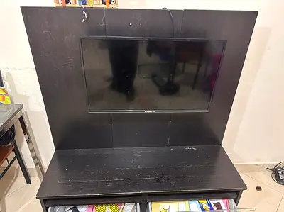 32 inch TV along with TV stand available