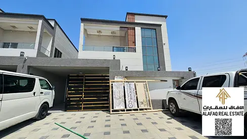 Modern villa for sale in Al Helio 2, Ajman. Personal finishing, spacious layout with 4 master bedrooms, prime location near nurseries, price AED 2.05M