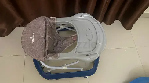 Lightly used baby walker with padded seat