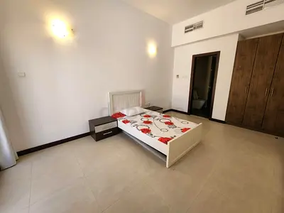 Private room with bathroom attached for Monthly room near exit to Al khail road