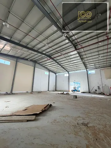 2 warehouses in UAQ Umm Al Thuoob, 10,000 sq ft, 50kW, on 2 roads, AED 430K yearly, must rent together, handover in 1 month