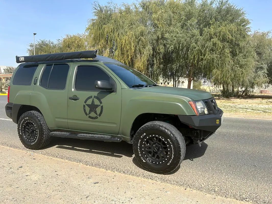 Nissan Xterra 2015 — photo 1 of 13