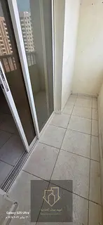 Spacious one-bedroom apartment with living room and balcony in a prime location in Al Nuaimiya 2 clo