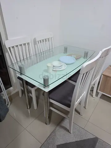 Glass Top Dining Table with 4 White chairs