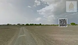 Investment land at a below-market price in Al Manama, Block 8, Ajman. Residential/Commercial.