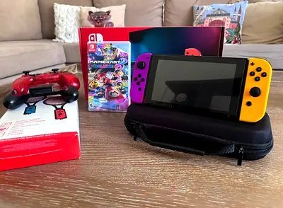 Nintendo Switch Console (not Oled) with Mario kart and accessories