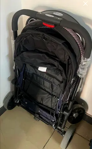 Compact foldable stroller - good condition