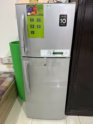 Silver double-door refrigerator - good working condition