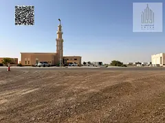 Residential plot of land in Manama 14, including fees, at a special price In front of the mosque