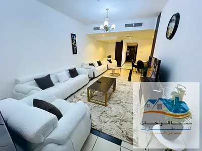 الشارقة القصباء مركز الفردان شقة غرفة وصالة و2حمام ومطبخ فيواكامل علي كورانيش البحيرة فرش جديد ب الكامل