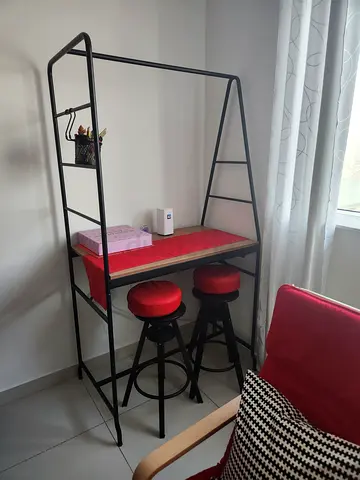 Compact Black Metal Kitchen Island with Two Red Stools - Like New