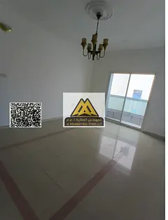 Apartment in Al Rumaila 1, two bedrooms and living room, 3 bathrooms, central AC, second row from Aj
