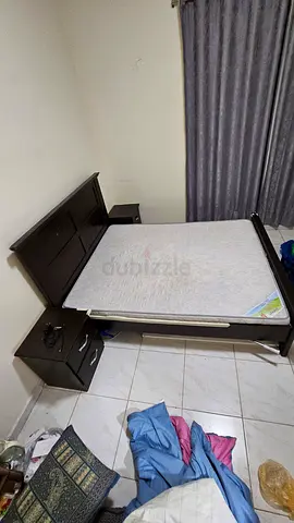 Queen-size double bed with mattress, side tables and dressing table