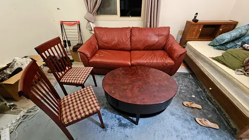 Used 3-Seater Leather Sofa cum bed + 2 Dining Chairs  Round Coffee Table - Good Condition