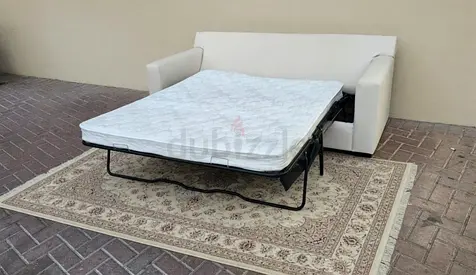 Beige colour Cratebarrel sofa bed with mattress