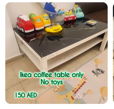 IKEA coffee table with black marble top — good condition