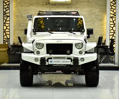 EXCELLENT DEAL for our Jeep Wrangler Unlimited Sport ( 2014 Model ) in White Color GCC Specs