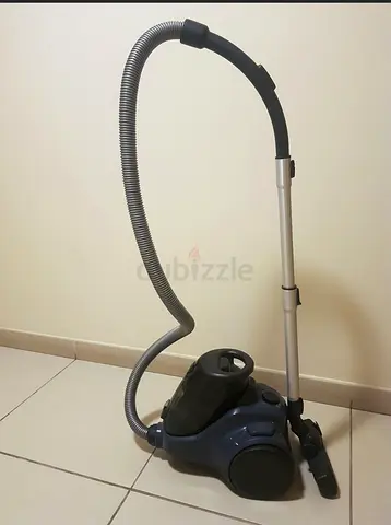 Used canister vacuum cleaner - good working condition