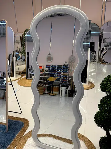 Full-length decorative wavy mirror in white frame