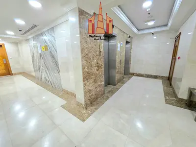 Luxurious 1bhk apartments with balcony 2bathroom wardrobe parking family building in Muwaileh