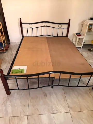 Queen-size metal bed frame with wooden slats (used) and matress