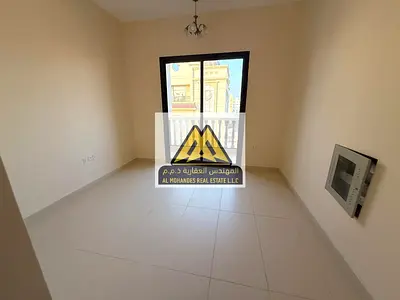 استوديو أول ساكن للإيجار السنوي في العالية عجمان بلكونة تكييف مركزي موقع مباشر على شارع محمد بن زايد