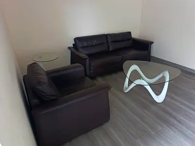 Black Leather 2-Seater Sofa + Armchair with Glass Coffee Table (Set)