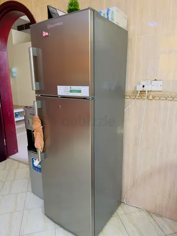 Silver Double-Door Refrigerator - Good Working Condition