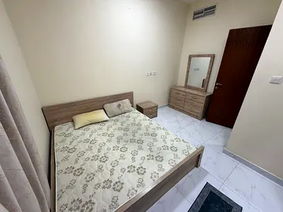 Furnished one-bedroom apartment in Al Rashidiya, prime location close to all services, easy access to the Dubai-Sharjah highway.