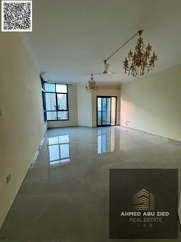 Luxury spacious 2BR with hall, 2 baths, maid room, balcony, open view, elegant finish, prime location, easy Dubai & Sharjah access.