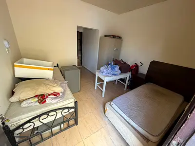 Studio apartment with separate kitchen, prime location on Sheikh Ammar Street, easy access to Dubai and Sharjah, payment plans available.