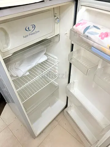 Small single-door refrigerator with freezer compartment - used
