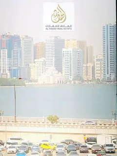 Luxury 3BR + Maid Room in Al Majaz 2 | Sea View + Spacious Balcony + Gym &amp; Pool + Parking