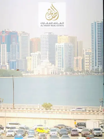 Luxury 3BR + Maid Room in Al Majaz 2 | Sea View + Spacious Balcony + Gym & Pool + Parking