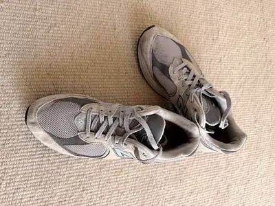 Light grey New Balance running sneakers, used good condition
