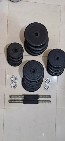 Set of 4 Round Weight Plates (3, 2.5, 2, 1.25 kg each) - Used