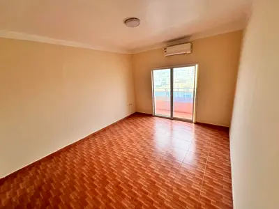 Studio for Rent in Al Rawda 2 Ajman behind Layali Beirut Street Makkah separate kitchen balcony split AC AED 22,000 yearly