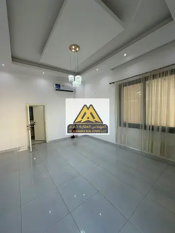 A great opportunity to rent a corner villa in Al Yasmeen, located in Al Ittihad Plan on an asphalt road,