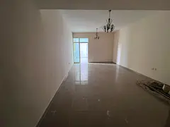 A one-bedroom apartment for annual rent in Horizon Towers, Al Rashidiya 1, Ajman. It boasts a prime