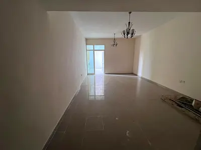 شقة غرفة وصالة للإيجار السنوي في أبراج الهورايزون بمنطقة الراشدية 1 عجمان، تقع في موقع مميز بجوار برج الساعة وأعلى الجمعية التعاونية ضمن منطقة حيوية و