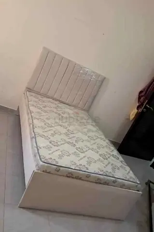 Twin size Bed with mattress.  Same day delivery available