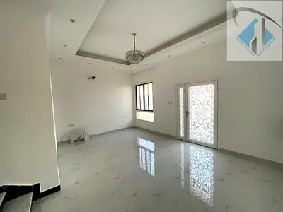 Two-story villa with a rooftop terrace, price includes registration and ownership fees, located on the main street, ready to move in, in one of Ajman'