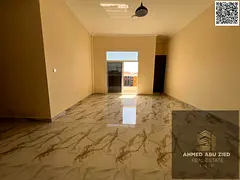 Annual rent: premium 2BR+hall, first tenant in Mowaihat 3. Spacious rooms, hall w/ open-view balcony