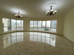 Three-bedroom apartment with free AC, parking, gym, and pool in Al Majaz 3