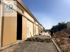 Warehouse / Garage for Rent in Ajman Near Car Showroom | Main Road + Labor Accommodation + Shops | I