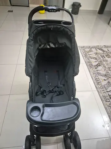 Well-used Black Standard Baby Stroller with Snack Tray