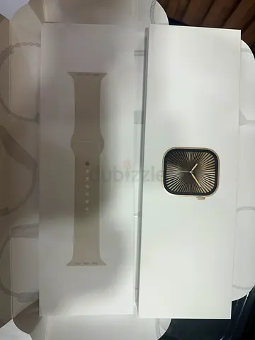 Apple Watch MWYX3QA/A Series 10 GPS + Cellular 46mm Gold Titanium  with Starlight Sport Band - S/M