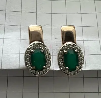 Silver earnings 925 gold plated with zircons and emerald
