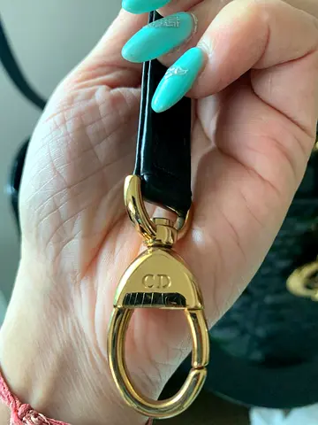 Genuine Christian Dior leather key strap with gold-tone CD clasp